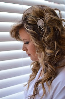 woman-looking-at-blinds